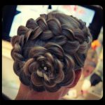 updo-with-a-braided-flower